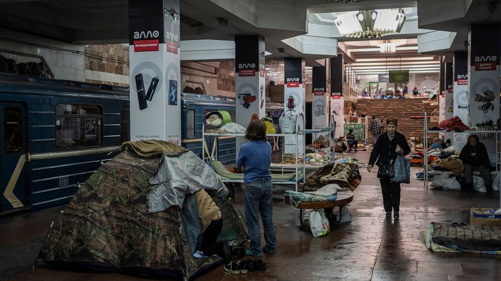 Residents live in a subway station still used as temporary shelter in Kharkiv, eastern Ukraine, Tuesday, May 24, 2022. Kharkiv subway resumed service on Tuesday morning after it was closed for more than two months during Russian attempt to capture th