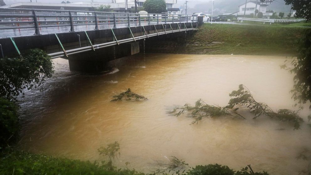 Heavy rainfall in Japan causes mudslide, threatens floods