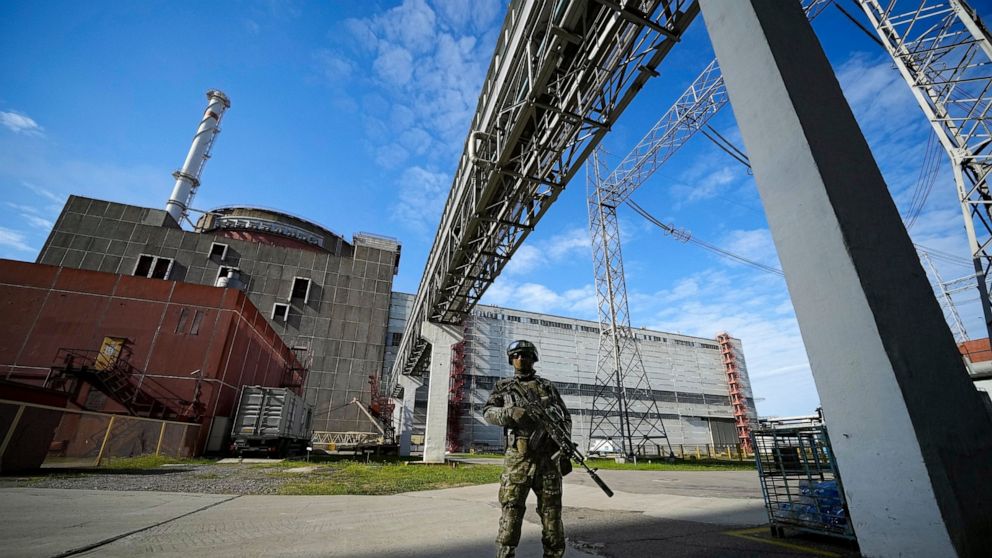 FILE - A Russian serviceman guards in an area of the Zaporizhzhia Nuclear Power Station in territory under Russian military control, southeastern Ukraine, on May 1, 2022. Ukraine's Zaporizhzhia nuclear power plant, the biggest in Europe, has lost its