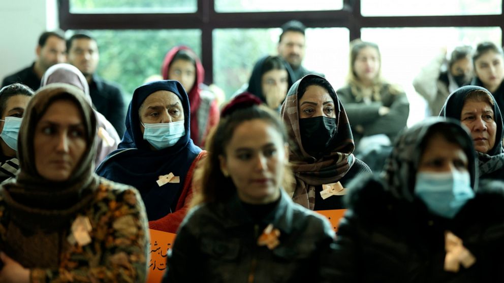 Afghan women take part in the awareness meeting on violence against women, at a coastline tourist resort in Golem, 50 kilometers (30 miles) west of Tirana, Albania, Friday, Dec. 10, 2021. Afghan women evacuated to Albanian after the Taliban came to p