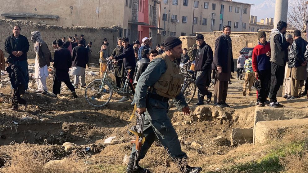 Security personnel arrive near the site of an attack near the Bagram Air Base In Parwan province of Kabul, Afghanistan, Wednesday, Dec. 11, 2019.A powerful suicide bombing Wednesday targeted an under-construction medical facility near the Bagram Air 