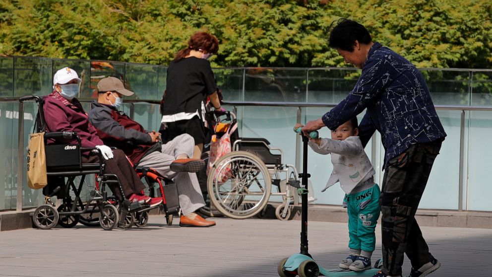 China adds few babies, loses workers as its 1.4B people age