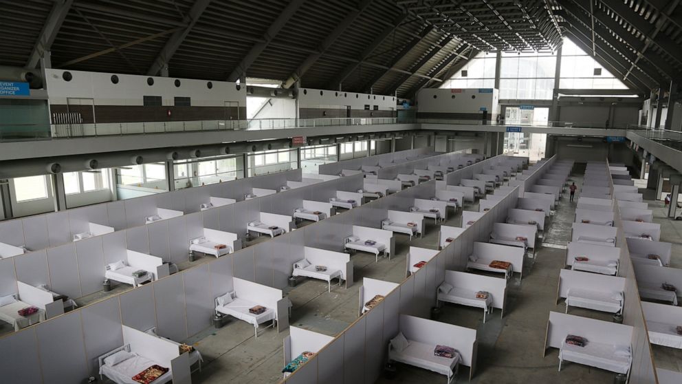 An emergency hospital is set up with nine hundreds beds for coronavirus infected patients, in the Expo Center, Lahore, Pakistan, Thursday, March 26, 2020. The virus causes mild or moderate symptoms for most people, but for some, especially older adul