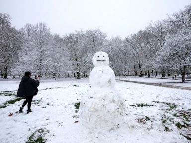3 children die after fall into icy lake; UK gripped by storm