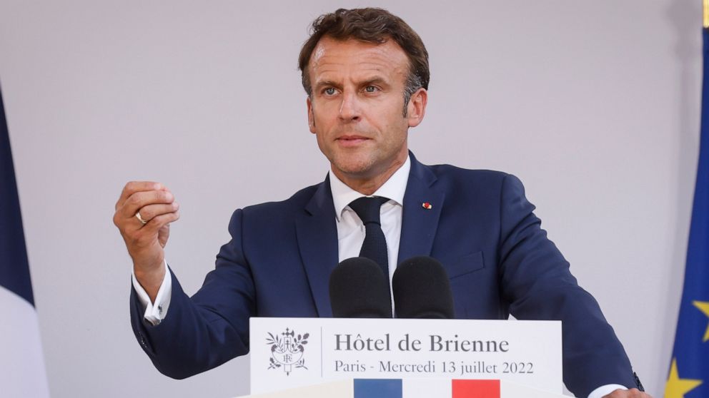 French President Emmanuel Macron delivers his speech to militaries on the eve of Bastille Day, Wednesday, July 13, 2022 at the Defense Minister's residence in Paris. France will celebrates its national holidays Thursday with thousands of French and a