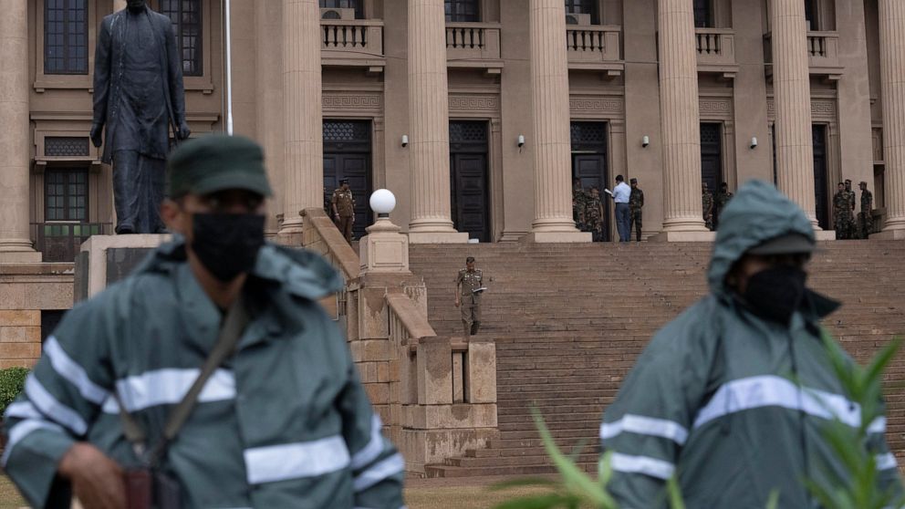 Army soldiers stand guard after removing the protesters and their tents from the site of a protest camp outside the Presidential Secretariat in Colombo, Sri Lanka, Friday, July 22, 2022. (AP Photo/Rafiq Maqbool)