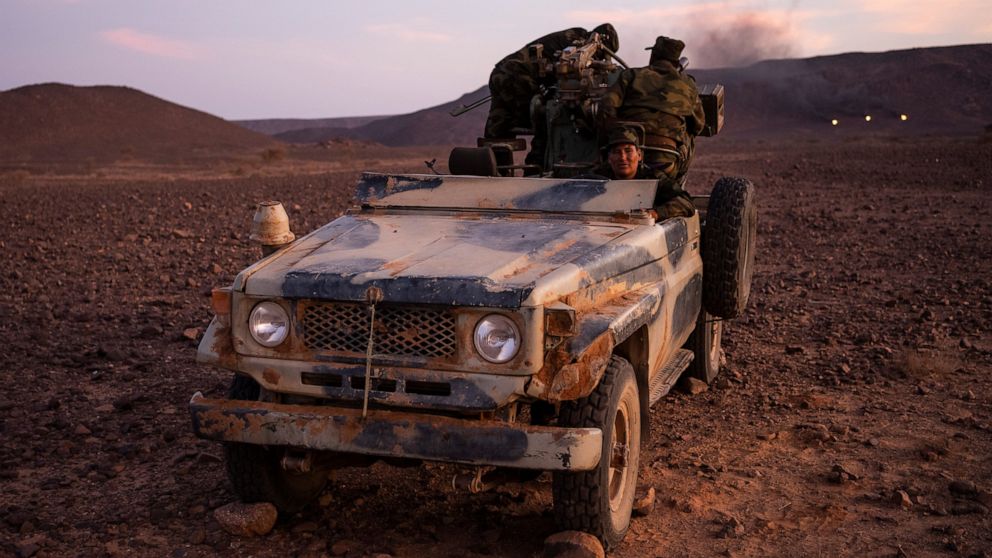 Polisario Front soldiers during a shooting exercise, near Mehaires, Western Sahara, Wednesday, Oct. 13, 2021. For nearly 30 years, the vast territory of Western Sahara in the North African desert has existed in limbo, awaiting a referendum that was s