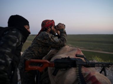Civilians evacuated from last Islamic State holdout in Syria
