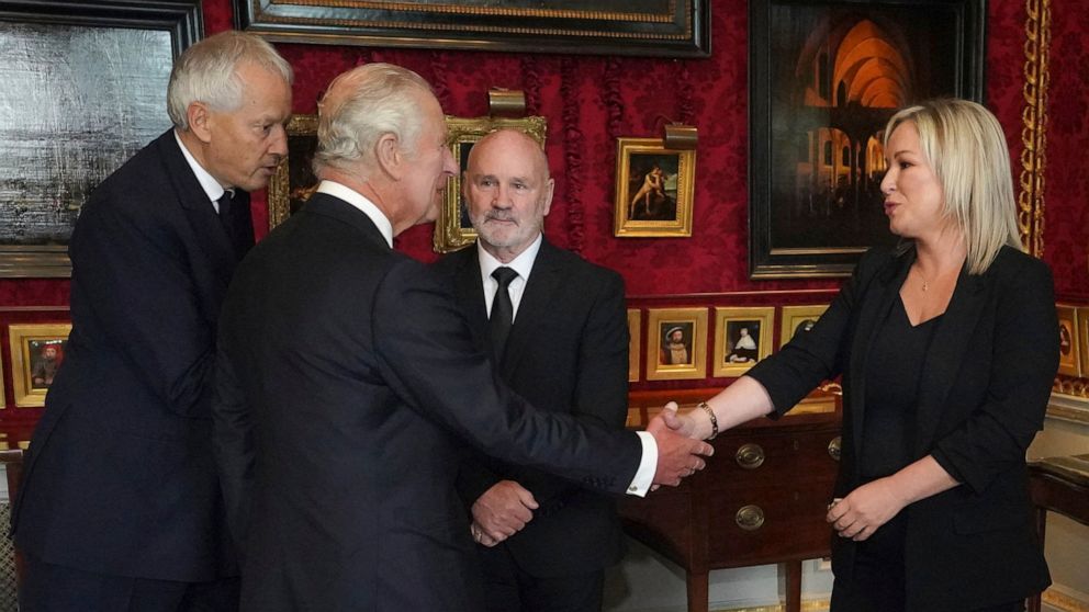 Britain's King Charles III meets Northern Ireland Assembly Speaker Alex Maskey, second left, and Sinn Fein Vice President Michelle O'Neil at Hillsborough Castle, Belfast, Tuesday Sept. 13, 2022. King Charles III and Camilla, the Queen Consort, flew t