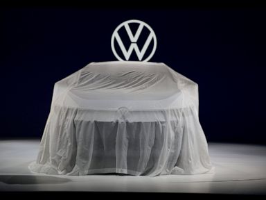 Volkswagen hits record sales in bid to top auto industry