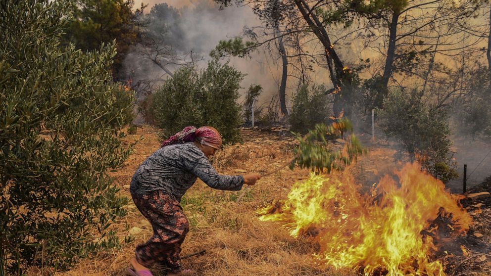 Fire crews still battling Turkish blazes as some reignite