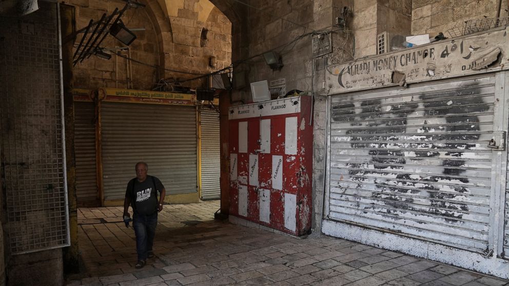 Palestinians strike in east Jerusalem over police raids