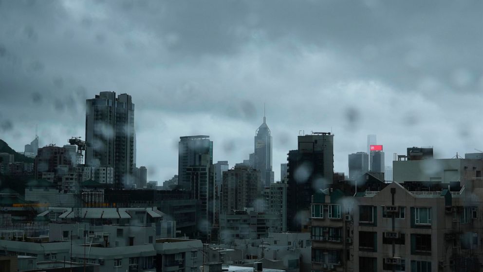 A Hong Kong general view is seen as Typhoon Kompasu passes in Hong Kong Wednesday, Oct. 13, 2021. Hong Kong suspended classes, stock market trading and government services as the typhoon passed south of the city Wednesday. (AP Photo/Vincent Yu)