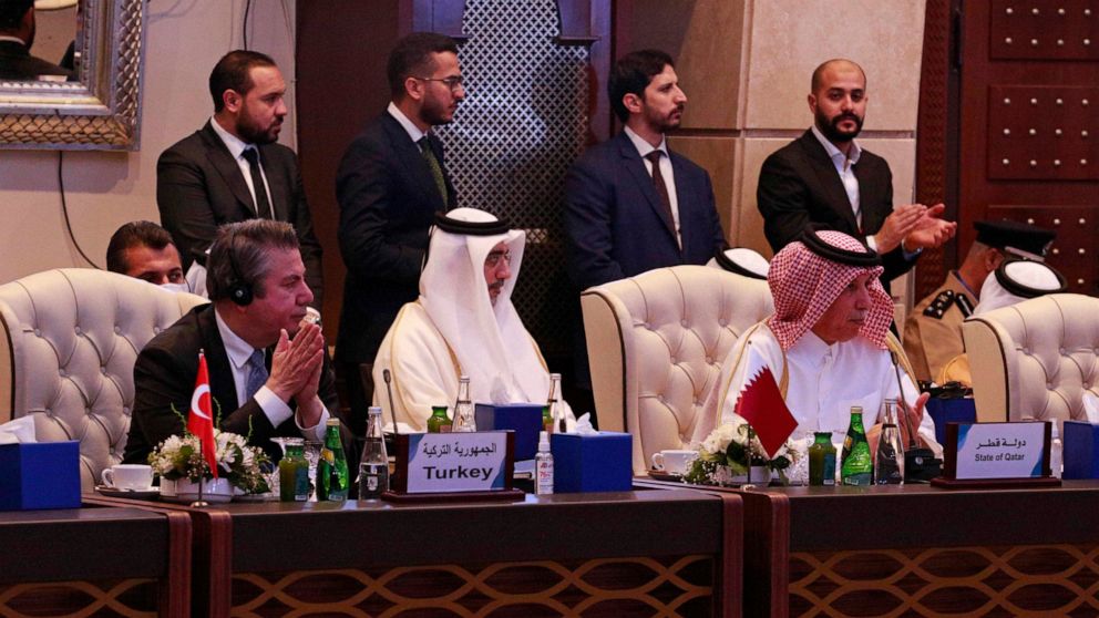 The delegations of Turkey and Qatar attend an international conference with western, regional and United Nations representatives aimed at resolving Libya's thorniest issues ahead of general elections planned for December, at the Coronthia Hotel in Tr