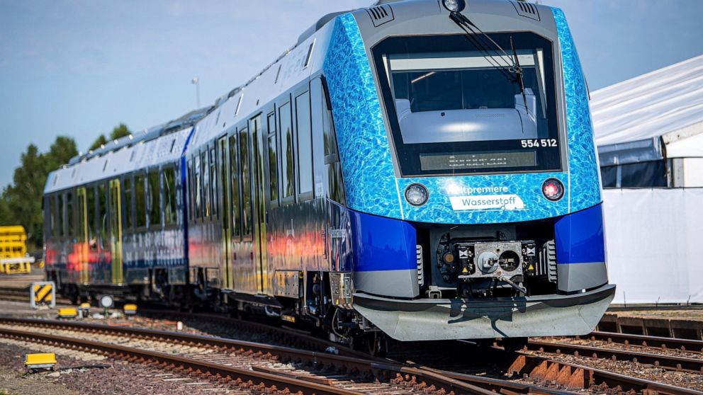 A hydrogen-powered regional train stands at Bremervoerde station, Germany, Wednesday, Aug. 24, 2022. In the fight against climate change, 14 hydrogen trains are to replace the current diesel trains. In Bremervoerde, a trial operation with two prototy