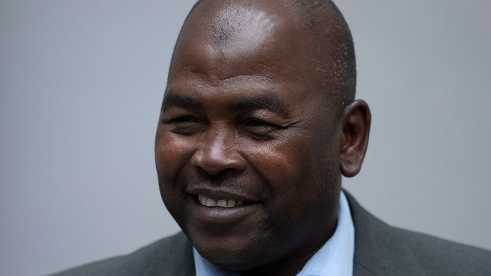 Mahamat Said Abdel Kani enters the court room of the International Criminal Court in The Hague, Netherlands, Monday, Sept. 26, 2022. The trial of an alleged commander in a mainly Muslim rebel group from Central African Republic opened and charged Sai
