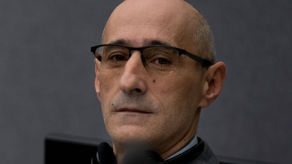 Salih Mustafa, a former Kosovo rebel, waits in the Kosovo Specialist Chambers court for the judges to read the verdict in The Hague, Netherlands, Friday, Dec. 16, 2022. Mustafa is charged with the war crimes of arbitrary detention, cruel treatment, t