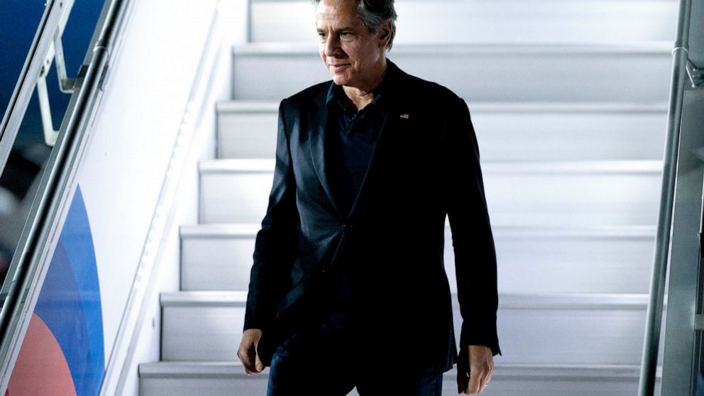 U.S. Secretary of State Antony Blinken arrives at Tempat Penimbunan Sementara International Airport, Thursday, July 7, 2022, in Bali, Indonesia, for the G-20 Foreign Ministers' Summit. (Stefani Reynolds/Pool Photo via AP)