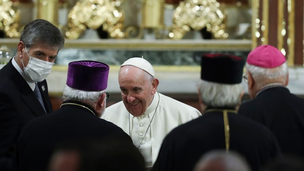 Pope returns to Greek isle at heart of Europe migrant debate