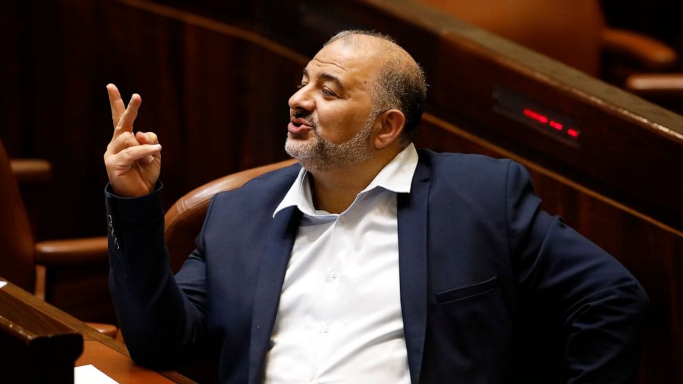 FILE - Leader of the United Arab List Mansour Abbas attends a Knesset session in Jerusalem Sunday, June 13, 2021. The head of an Arab party in Israel who made history last year by joining the governing coalition said Thursday, Feb. 10, 2022, he would