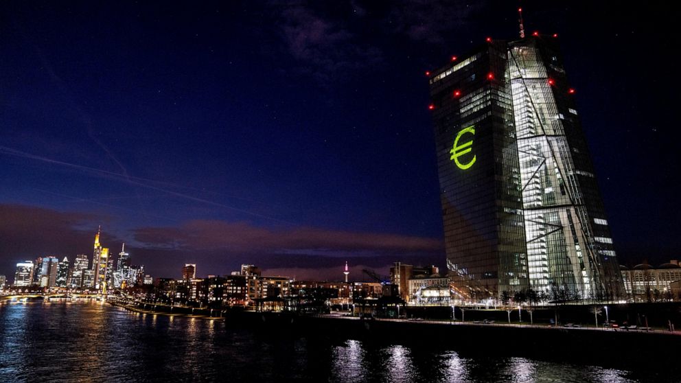 A light installation is projected onto the building of the European Central Bank during a rehearsal in Frankfurt, Germany, Thursday, Dec. 30, 2021. The light show will mark the 20th anniversary of the European currency Euro on New Year's Eve. (Photo/