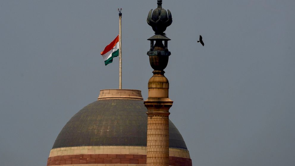The Indian flag flies at half-mast at the Indian Presidential Palace following Thursday’s death of Britain's Queen Elizabeth II in New Delhi, India, Sunday, Sept.11, 2022. (AP Photo/Manish Swarup)