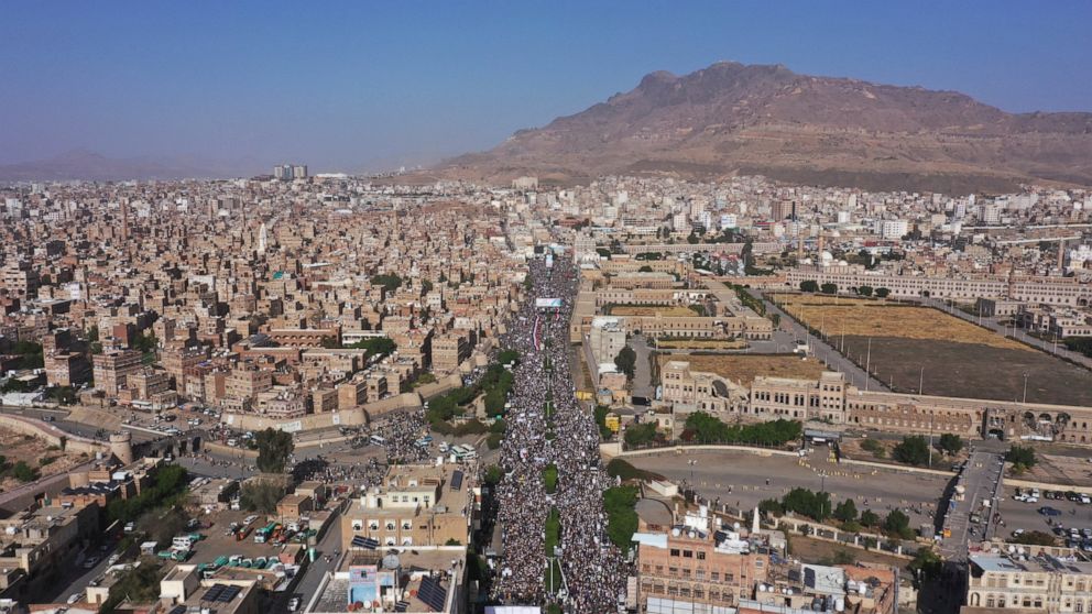 FILE - Houthi supporters attend a rally marking the seventh anniversary of the Saudi-led coalition's intervention in Yemen's war, in Sanaa, Yemen, March 26, 2022. Hans Grundberg, the U.N. special envoy for Yemen arrived Monday, April 11, 2022, in the