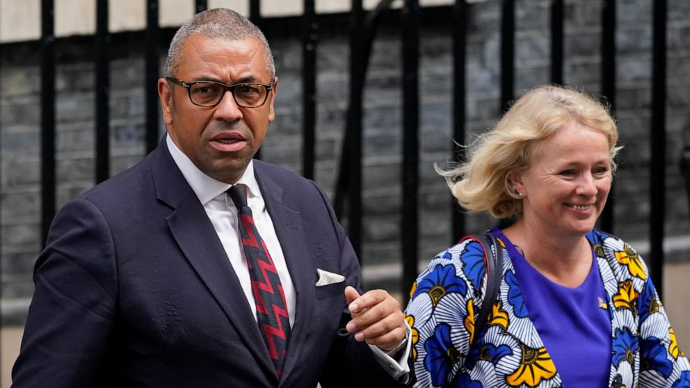 Britain's Foreign Secretary James Cleverly, left, and Vicky Ford, development minister in the Foreign Office leave 10 Downing Street in London, Wednesday, Sept. 7, 2022 after attending the first cabinet meeting since Liz Truss was installed as Britis