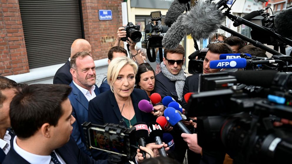 French far-right leader Marine Le Pen adresses reporters Monday, June 20, 2022 in Henin-Beaumont, northern France. French President Emmanuel Macron's centrist alliance was projected to lose its majority despite getting the most seats in the final rou