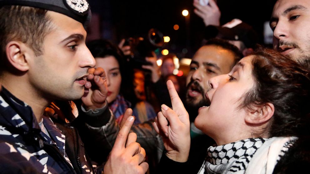 Lebanese protesters block road outside central bank