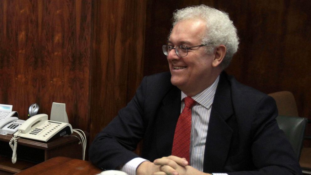 FILE - World Bank presidential nominee Jose Antonio Ocampo, of Colombia, speaks with Brazil's Economy Minister Guido Mantega, not in photo, in Brasilia, Brazil, April 12, 2012. Ocampo, Colombia´s new economy minister, said in a Tuesday, July 12, 2022