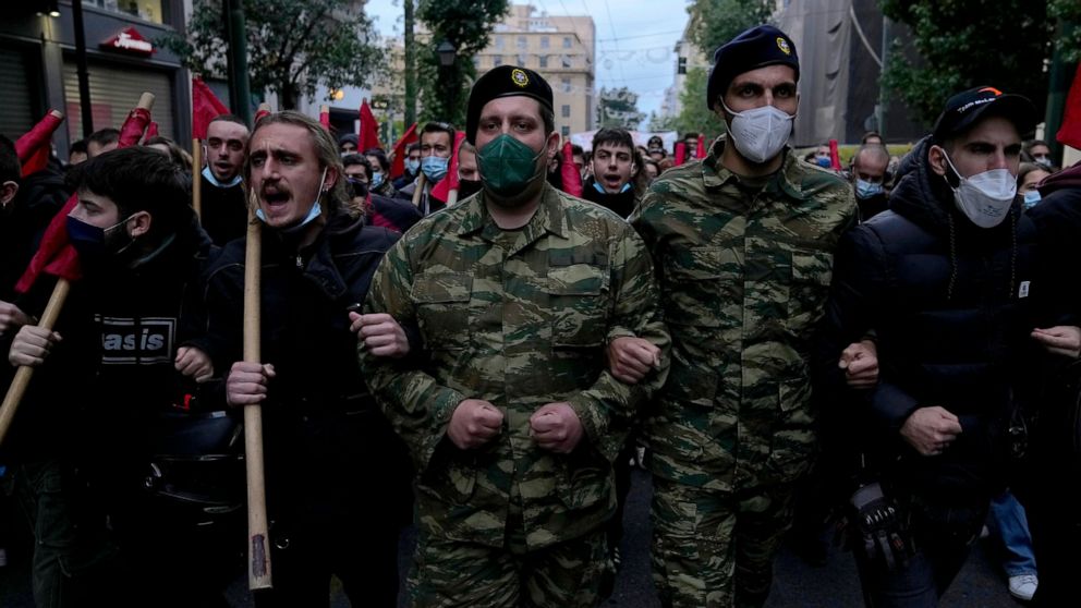 Greeks hold peaceful march on deadly uprising anniversary