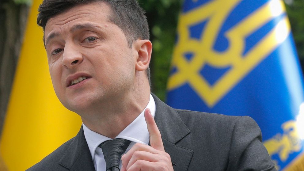 Ukraine's President Volodymyr Zelenskiy speaks to the media during a news conference in Kyiv, Ukraine, Wednesday, May 20, 2020. At the press conference marking Zelenskiy's one year in office, the president answered questions about domestic affairs, f