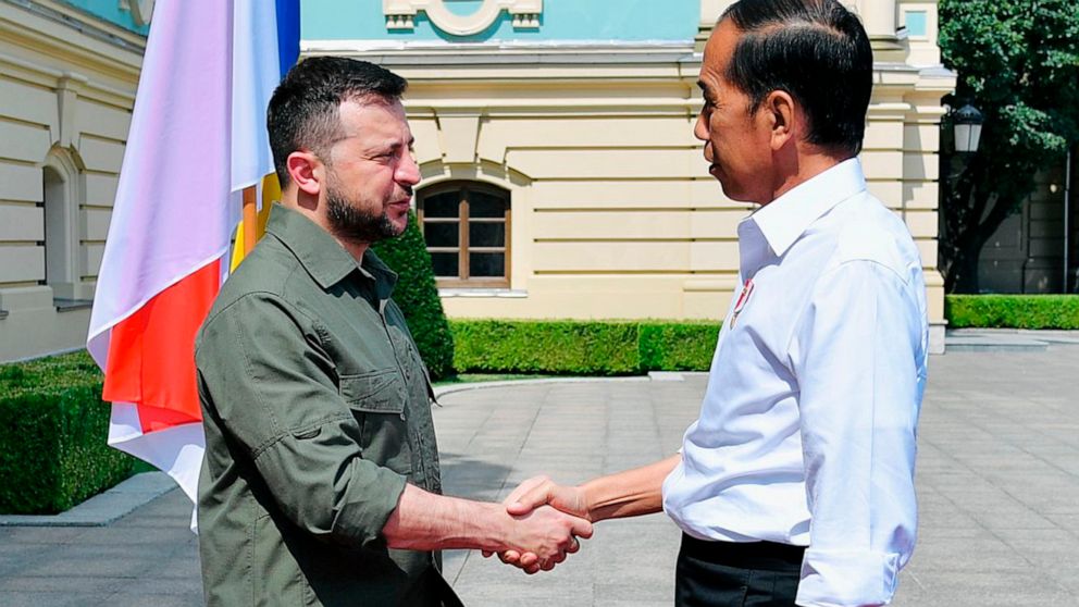 In this photo released by Indonesian Presidential Palace, Indonesian President Joko Widodo, right, shakes hands with his Ukrainian counterpart Volodymyr Zelensky during their meeting in Kyiv, Ukraine on Wednesday, June 29, 2022. Widodo, whose country