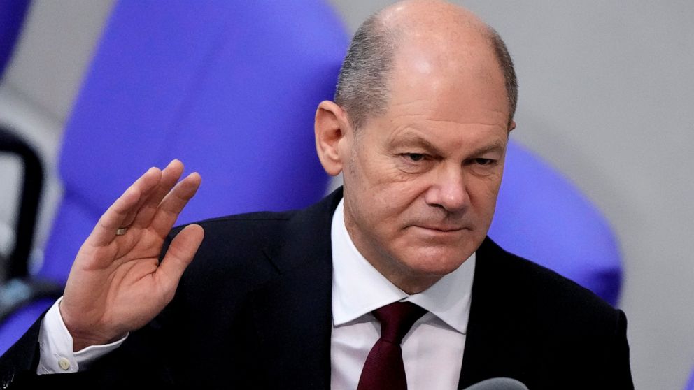 New elected German Chancellor Olaf Scholz is sworn in by parliament President Baerbel Bas in the German Parliament Bundestag in Berlin, Wednesday, Dec. 8, 2021. The election and swearing-in of the new Chancellor and the swearing-in of the federal min