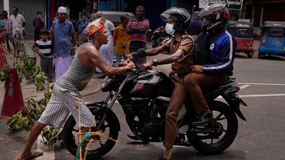 Sri Lankan prime minister resigns after weeks of protests