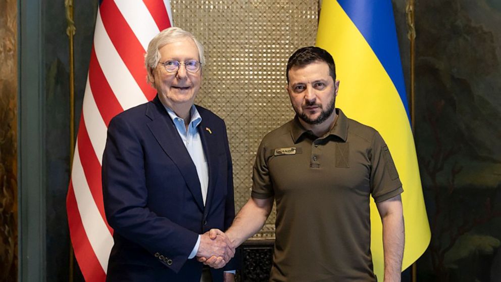 In this handout photo provided by the Ukrainian Presidential Press Office, Ukrainian President Volodymyr Zelenskyy and Senate Minority Leader Mitch McConnell, R-Ky., pose for a photo in Kyiv, Ukraine, Saturday, May 14, 2022. (Ukrainian Presidential P