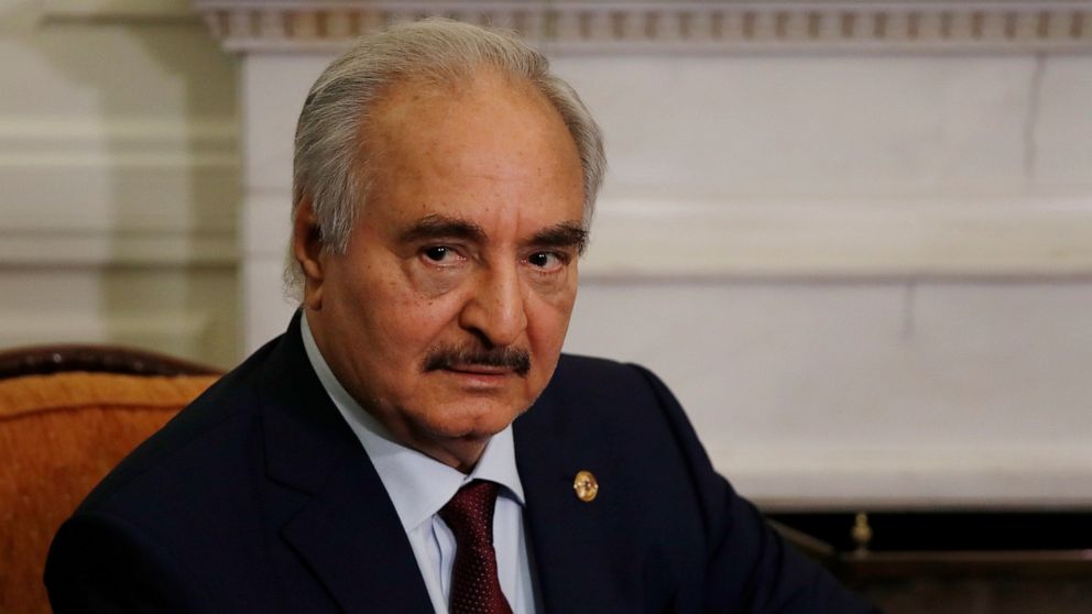 FILE - In this Jan. 17, 2020, file, photo, Libyan Gen. Khalifa Hifter joins a meeting with the Greek Foreign Minister Nikos Dendias in Athens. The U.S. military Tuesday, May 26, 2020 accused Russia of deploying fighter planes to conflict-stricken Lib