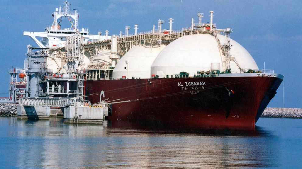 FILE - This undated file photo shows a Qatari liquid natural gas (LNG) tanker ship being loaded up with LNG, made up mainly of methane, at Raslaffans Sea Port, northern Qatar. The state-owned oil and gas company Qatar Energy said Monday, June 27, 202