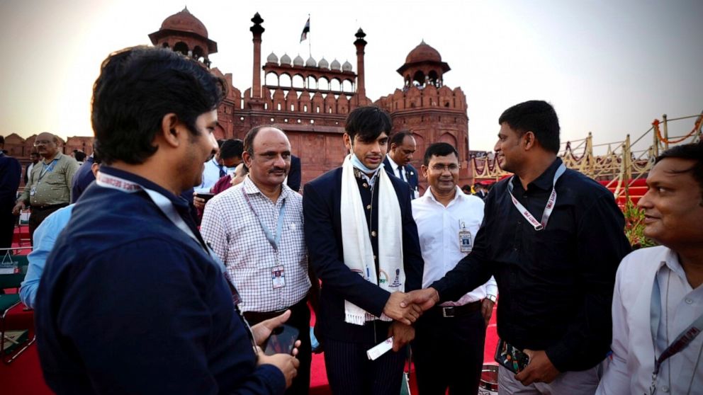 Olympic medalist Neeraj Chopra, center, arrives for the Independence Day celebrations at the historic 17th century Red Fort in New Delhi, India, on Sunay, Aug. 15, 2021. India commemorates its 1947 independence from British colonial rule on Aug. 15. 