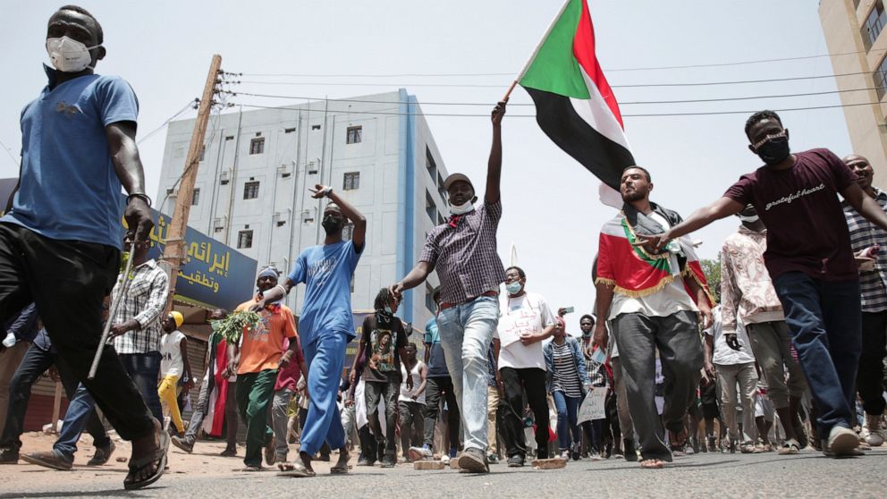 Sudanese anti-military protesters march in demonstrations in the capital of Sudan, Khartoum on June 30, 2022. A Sudanese medical group says multiple people were killed on Thursday in the anti-coup rallies during which security forces fired on protest