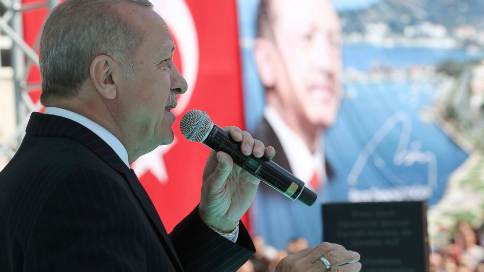 Turkey's President Recep Tayyip Erdogan addresses the supporters of his ruling Justice and Development Party during a rally in Eregli, Turkey, Tuesday, March 19, 2019. Ignoring widespread criticism, Erdogan has again shown excerpts of a video taken b