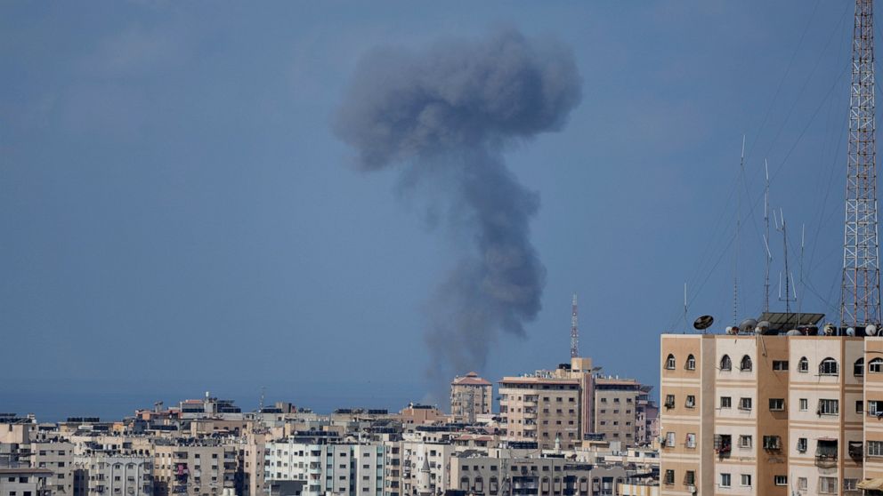 Smoke rises following Israeli airstrikes on a building in Gaza City, Saturday, Aug. 6, 2022. (AP Photo/Hatem Moussa)