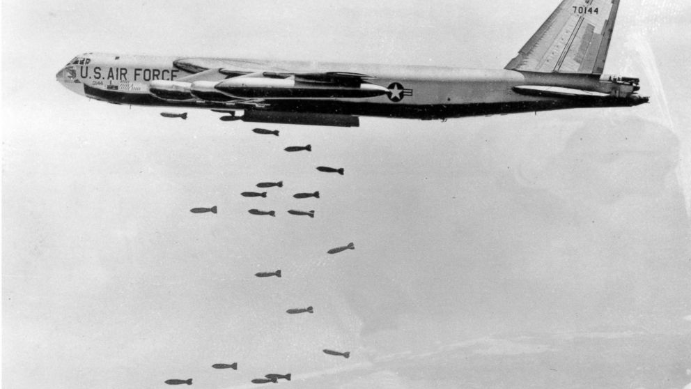 FILE - In this March 1966, file photo, a U.S. Air Force B-52 delivers a bomb load of more than 38,000 pounds against Viet Cong strongholds in South Vietnam during the Vietnam War. The Vietnamese capital Hanoi once trembled as waves of American bomber