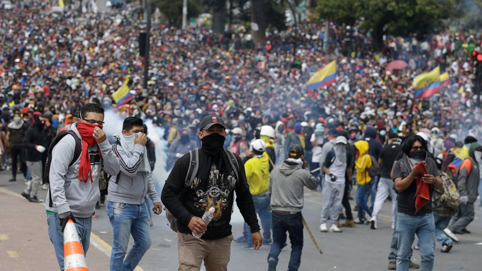 Enraged anti-government demonstrator gather during clashes with the police as they protest against President Lenin Moreno and his economic policies, in Quito, Ecuador, Tuesday, Oct. 8, 2019. Ecuador has endured days of popular upheaval since Presiden