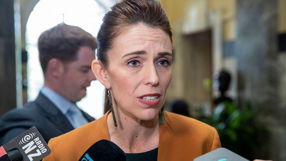 New Zealand Prime Minister Jacinda Ardern speaks during a media stand-up on her way to Question Time at Parliament, in Wellington, New Zealand Tuesday, Dec. 1, 2020. New Zealand has joined Australia in denouncing a graphic tweet posted by a Chinese o