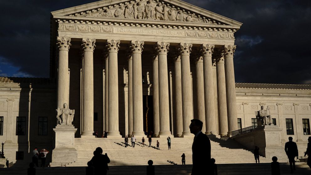 FILE - In this Oct. 22, 2021 file photo, the U.S Supreme Court building is seen at dusk in Washington. The Association of Puerto Rico Journalists on Friday, Oct. 29, 2021, petitioned the high court to hear its case against the U.S. territory's govern