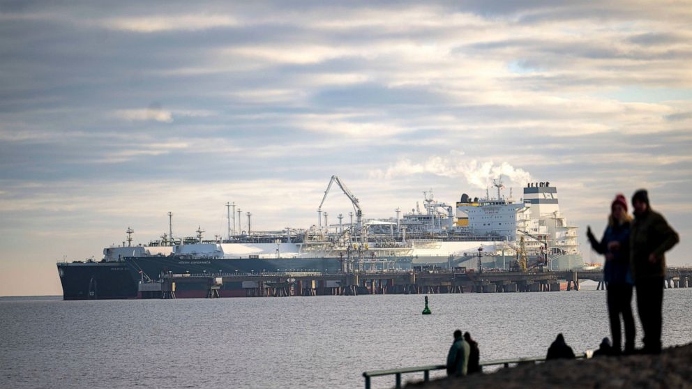The tanker "Maria Energy", left, loaded with liquefied natural gas, is moored at the floating terminal, the special ship "Hoegh Esperanza", in Wilhelmshaven, Germany, Tuesday Jan. 3, 2023. For the first time since the terminal opened in Wilhelmshaven