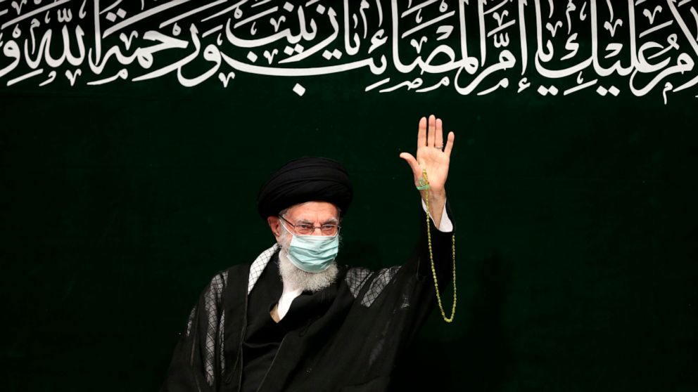 In this image released by the official website of the office of the Iranian supreme leader, Supreme Leader Ayatollah Ali Khamenei waves to his well-wishers during a religious ceremony, in Tehran, Iran, Saturday, Sept. 17, 2022. Khamenei spoke to stud