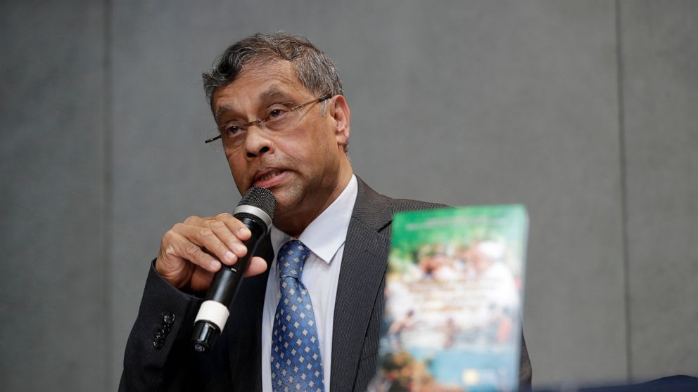 FILE - Aloysius John, Secretary General of Caritas International, speaks during a press conference to present a document on the 5th anniversary of Pope Francis' encyclical "Laudato si" (Praise Be) calling on the world to act to stop the human destruc